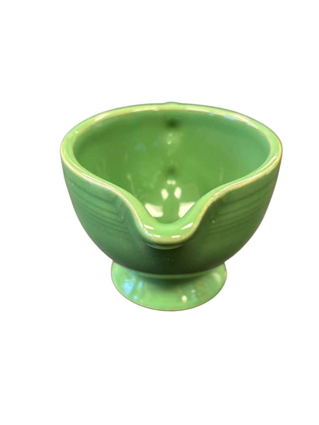 This is a Fiesta Fiestaware individual cream pitcher creamer in Meadow. lead-free, Post 1986, Retired Shape
