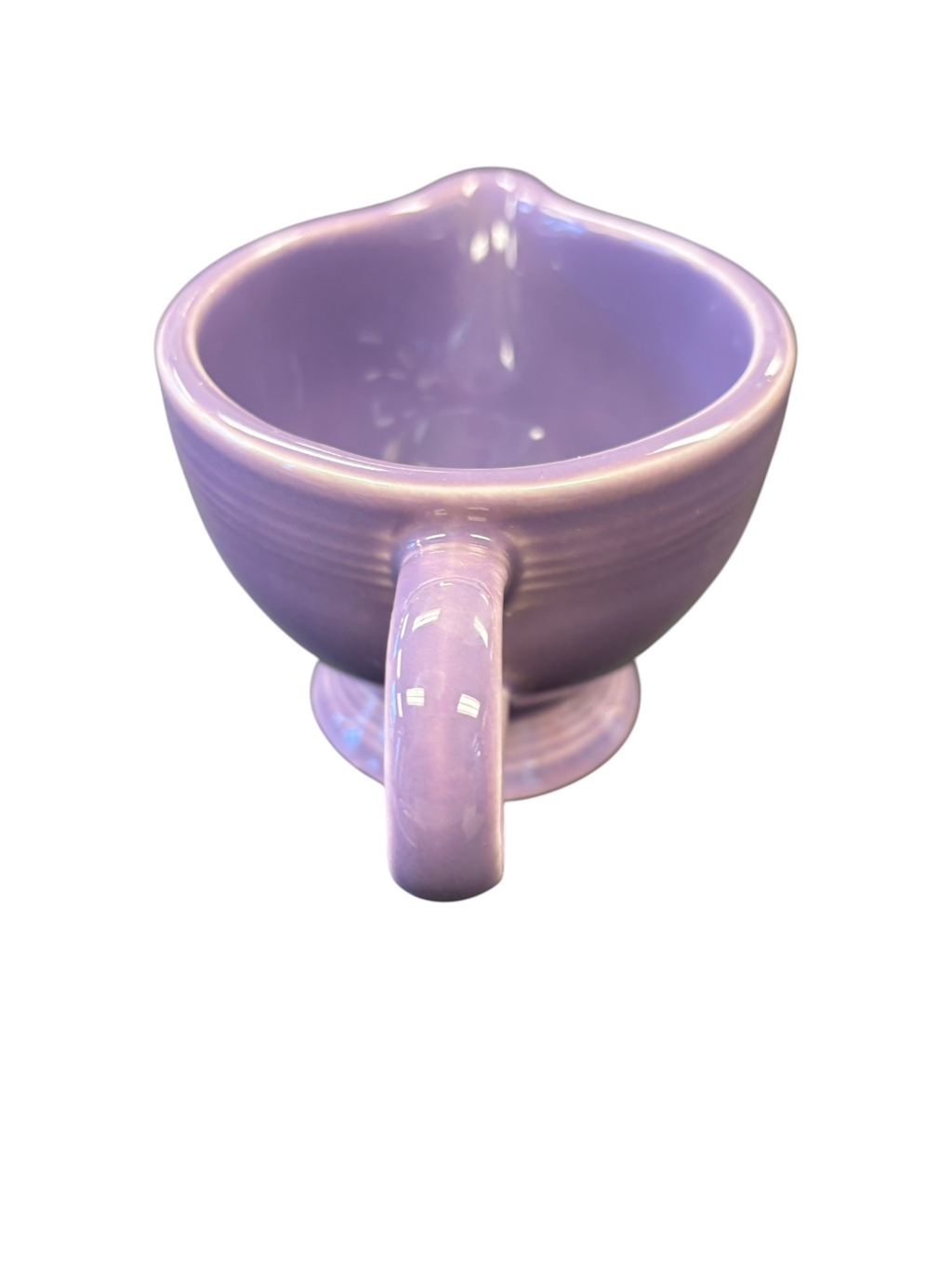 This is a Fiesta Fiestaware individual cream pitcher creamer in Lilac. lead-free, Post 1986, Retired Color Retired Shape
