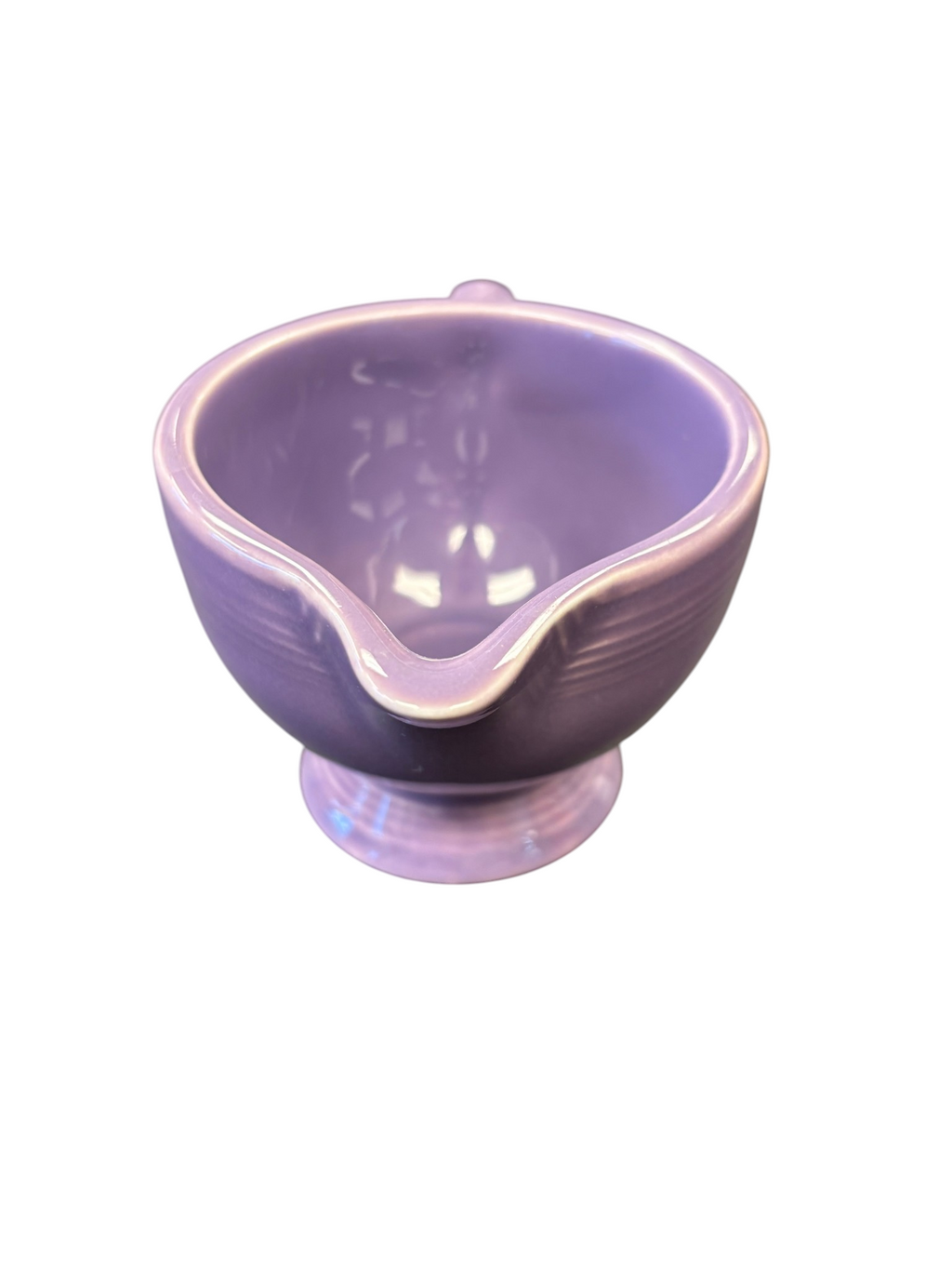 This is a Fiesta Fiestaware individual cream pitcher creamer in Lilac. lead-free, Post 1986, Retired Color Retired Shape
