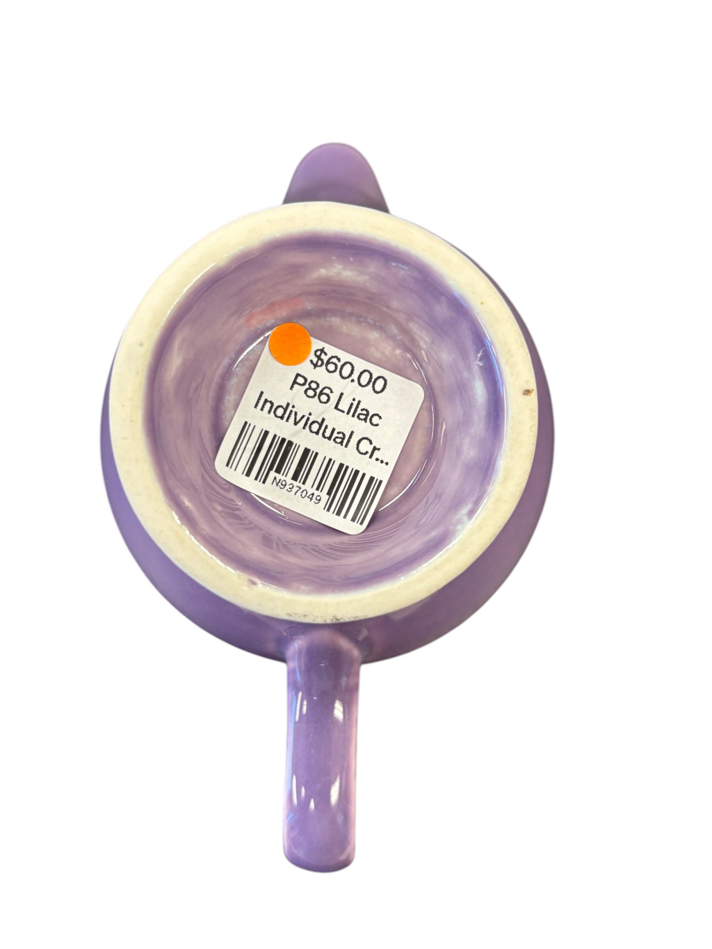 This is a Fiesta Fiestaware individual cream pitcher creamer in Lilac. lead-free, Post 1986, Retired Color Retired Shape
