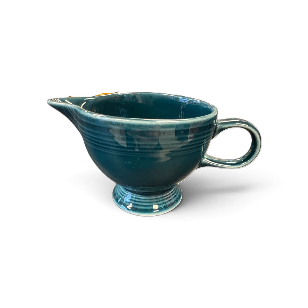This is a Fiesta Fiestaware individual cream pitcher creamer in Juniper. lead-free, Post 1986, Retired Color Retired Shape
