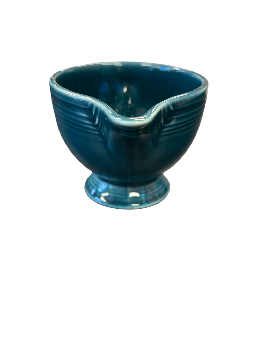 This is a Fiesta Fiestaware individual cream pitcher creamer in Juniper. lead-free, Post 1986, Retired Color Retired Shape

