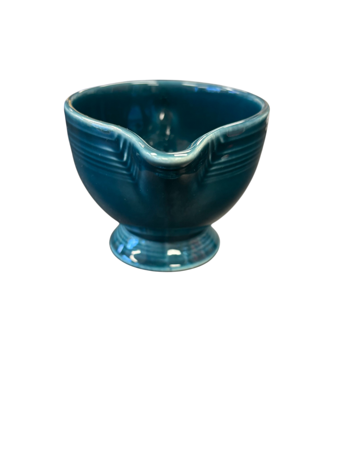 This is a Fiesta Fiestaware individual cream pitcher creamer in Juniper. lead-free, Post 1986, Retired Color Retired Shape
