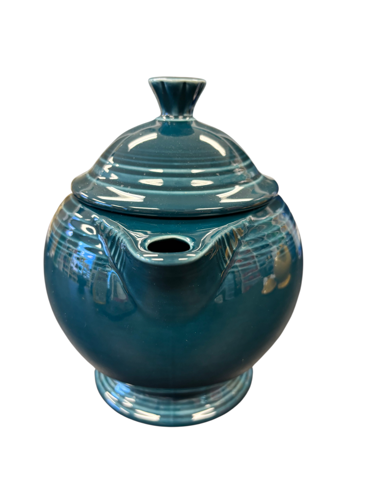 This is a Fiesta Fiestaware Five-cup 5-cup Ring Handled Tea Pot with Lid in Juniper. lead-free, Post 1986, Retired Color Retired Shape

