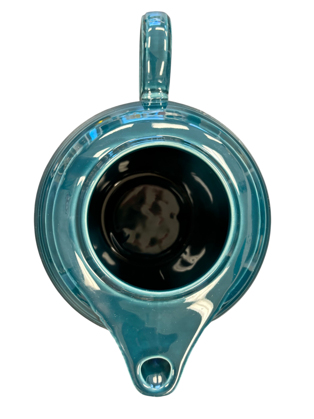 This is a Fiesta Fiestaware Five-cup 5-cup Ring Handled Tea Pot with Lid in Juniper. lead-free, Post 1986, Retired Color Retired Shape
