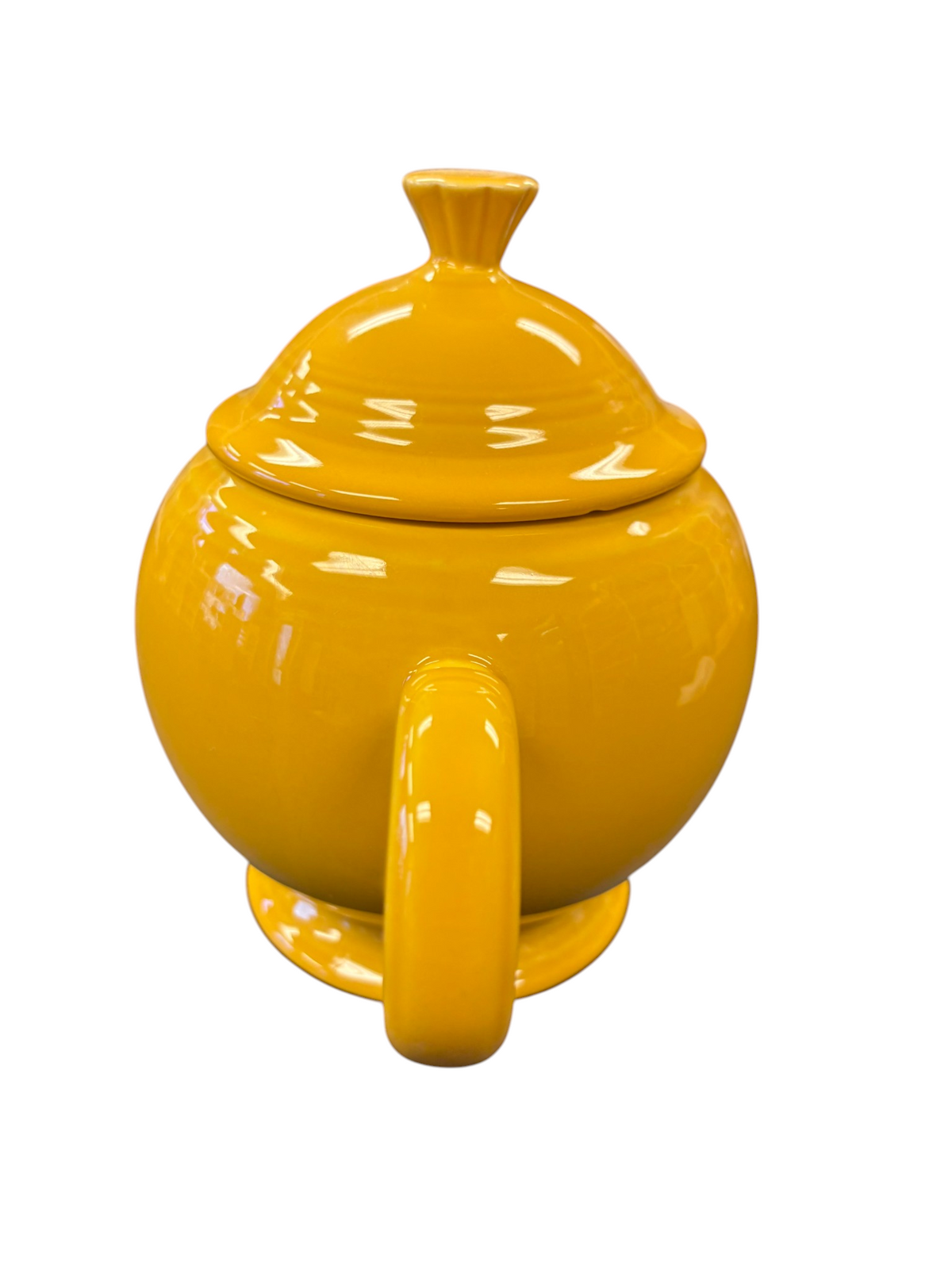 This is a Fiesta Fiestaware Five-cup 5-cup Ring Handled Tea Pot with Lid in Marigold. lead-free, Post 1986, Retired Color Retired Shape
