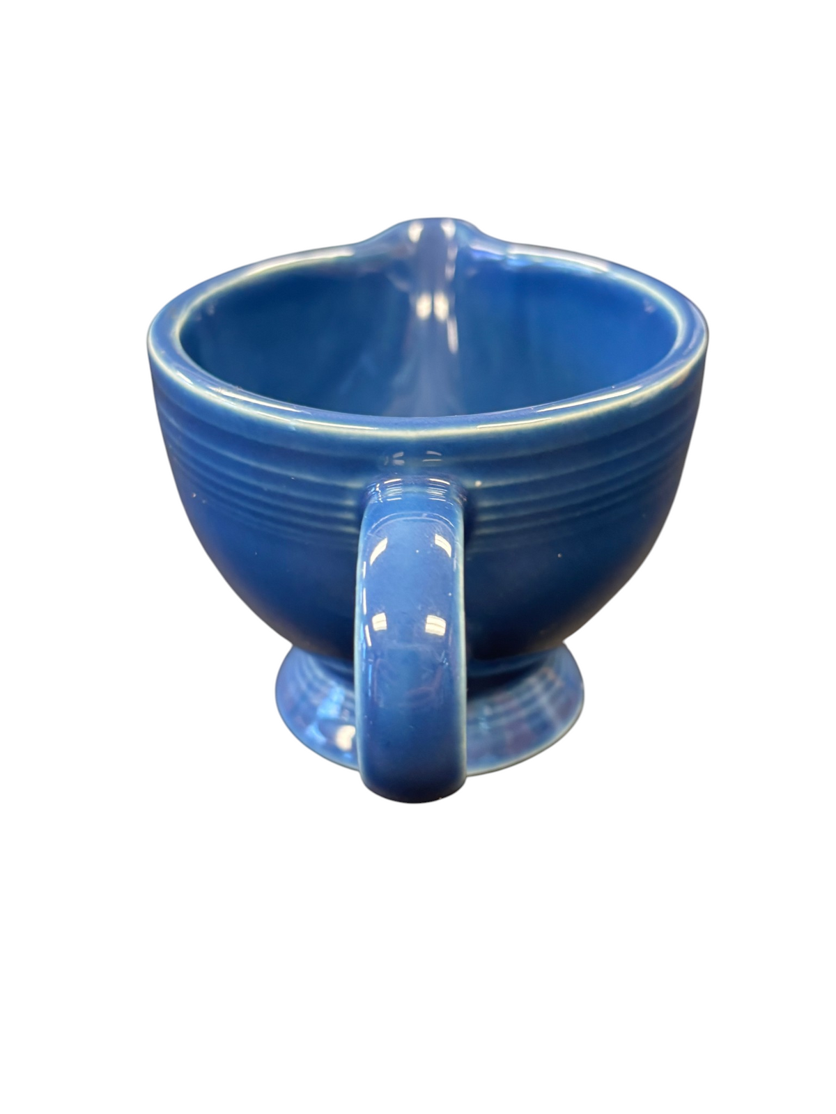 This is a Fiesta Fiestaware individual cream pitcher creamer in Lapis. lead-free, Post 1986, Retired Shape

