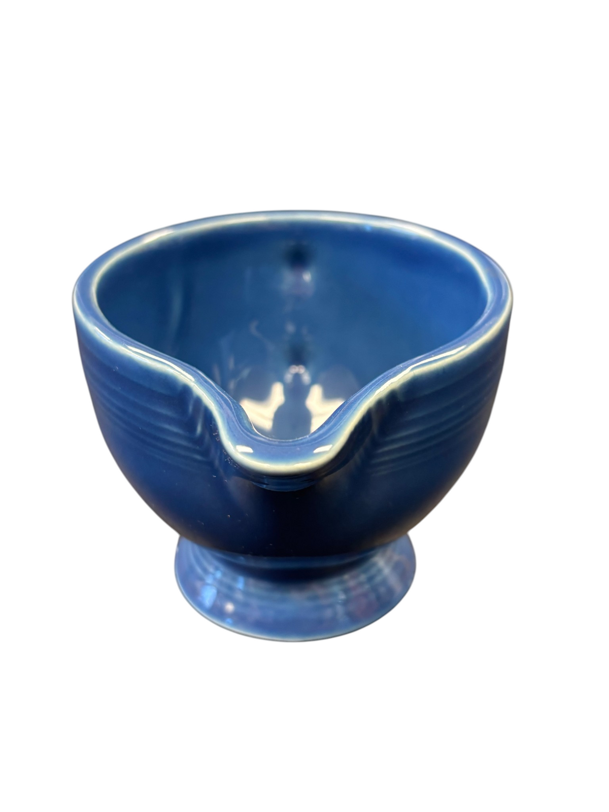 This is a Fiesta Fiestaware individual cream pitcher creamer in Lapis. lead-free, Post 1986, Retired Shape
