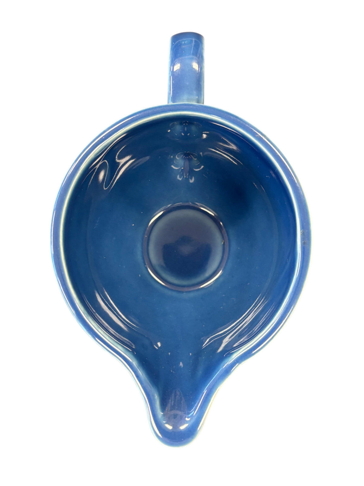 This is a Fiesta Fiestaware individual cream pitcher creamer in Lapis. lead-free, Post 1986, Retired Shape
