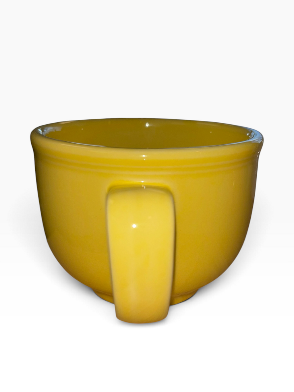 This is a Fiesta fiestaware Jumbo Mug featuring the Whoo Owl decal on sunflower. Lead free, Post 1986, Halloween, Retired Color, Retired Decal.
