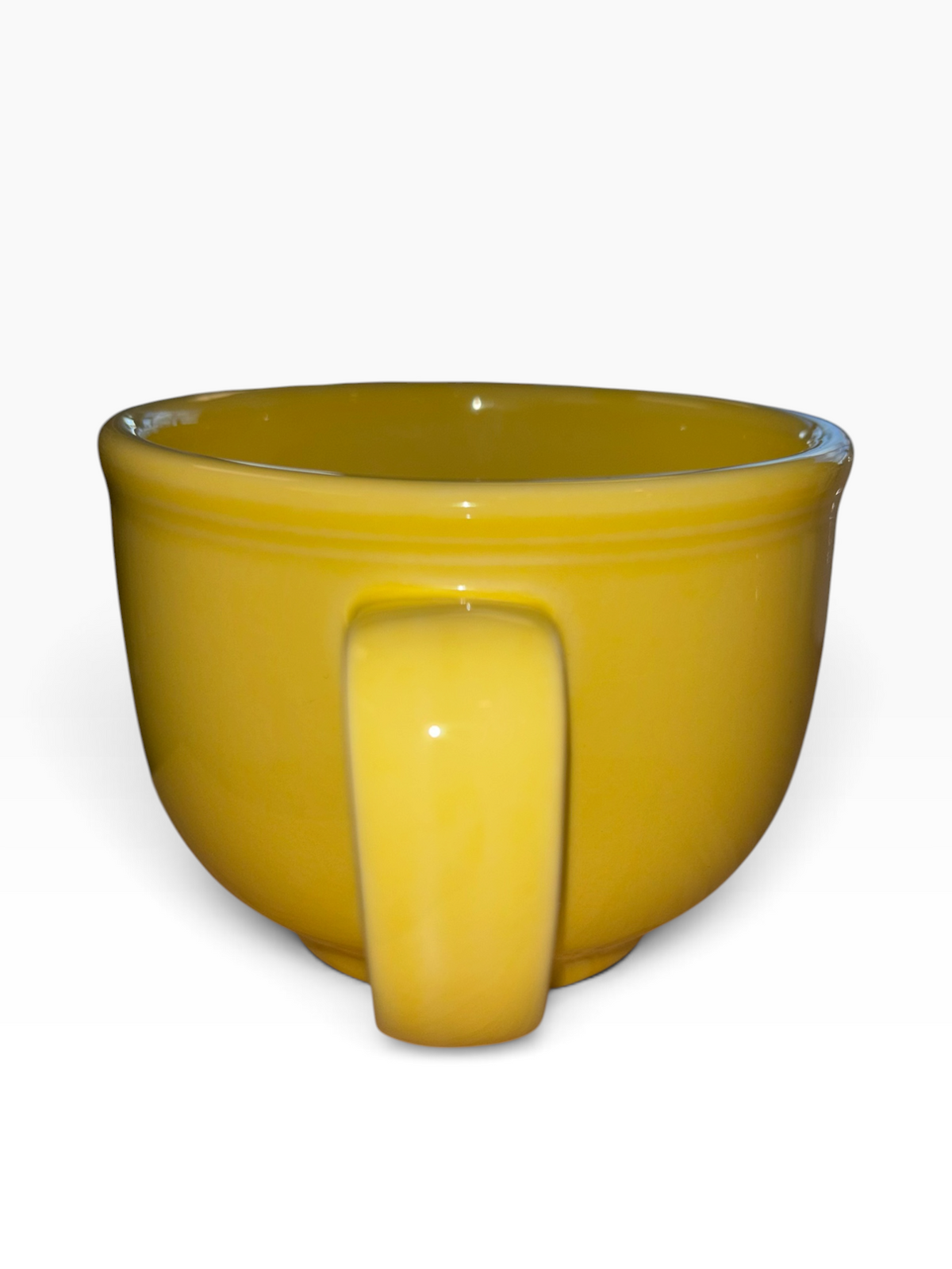 This is a Fiesta fiestaware Jumbo Mug featuring the Whoo Owl decal on sunflower. Lead free, Post 1986, Halloween, Retired Color, Retired Decal.
