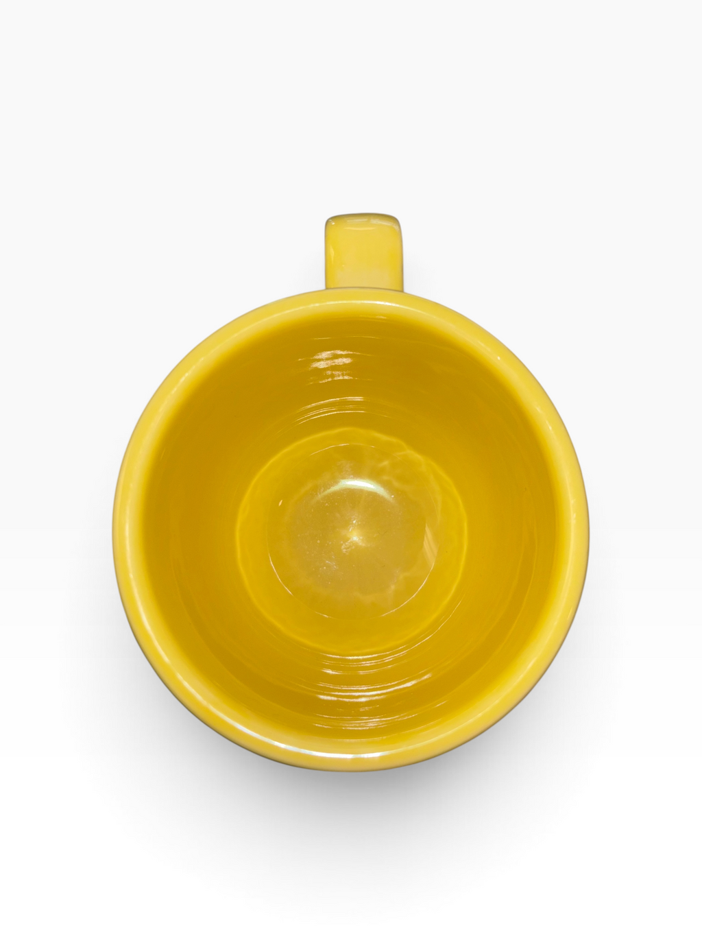 This is a Fiesta fiestaware Jumbo Mug featuring the Whoo Owl decal on sunflower. Lead free, Post 1986, Halloween, Retired Color, Retired Decal.
