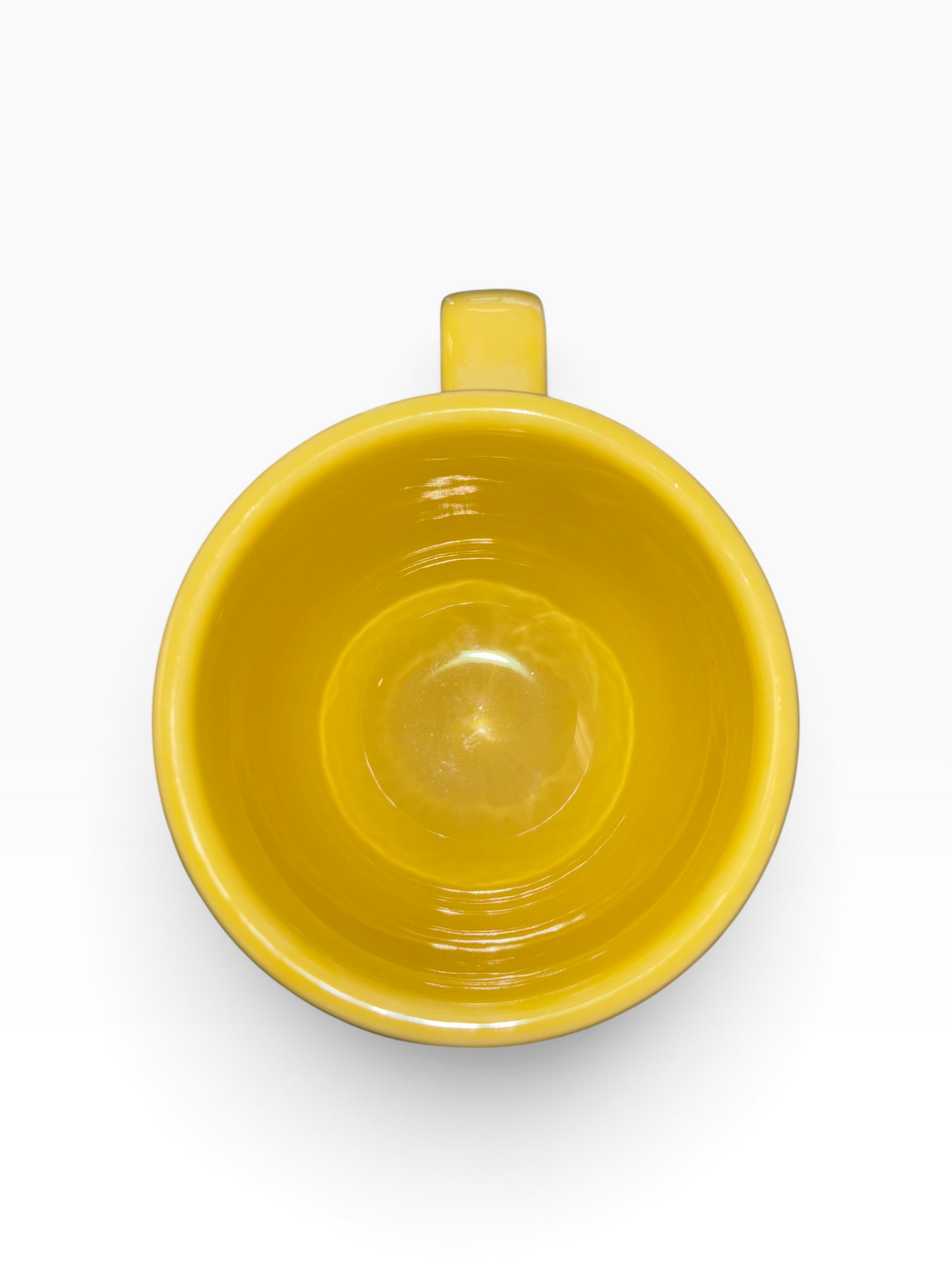 This is a Fiesta fiestaware Jumbo Mug featuring the Whoo Owl decal on sunflower. Lead free, Post 1986, Halloween, Retired Color, Retired Decal.
