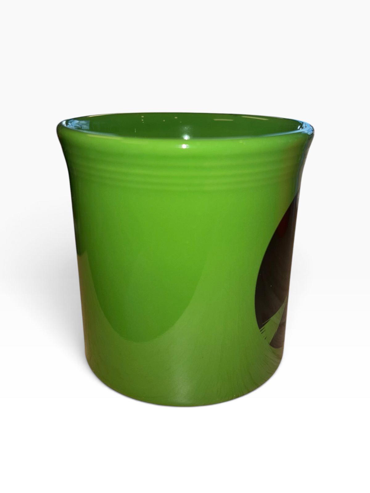 This is a Fiesta fiestware Java Mug featuring the Harvest Moon Witch decal on shamrock. Lead free Post 1986 Retired Color Retired Decal Halloween
