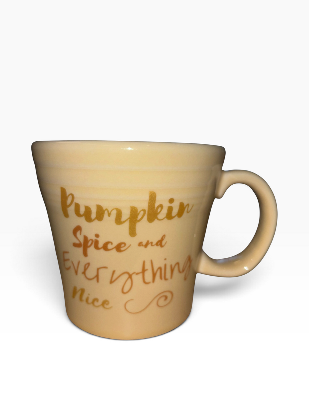 This is a Fiesta fiestaware Tapered Mug featuring the Pumpkin Spice and Everything Nice decal on Ivory. Lead free, Post 1986 Retired Decal, Retired Color, Fall, Pumpkin, Thanksgiving
