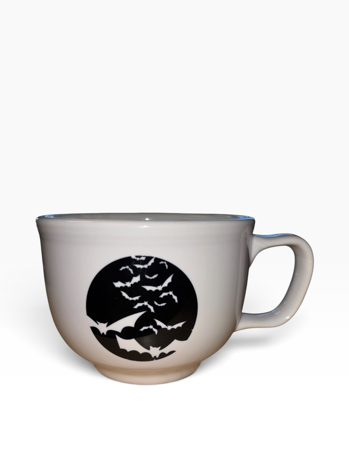 This is a Fiesta fiestaware Jumbo Mug featuring the Hallowwen Bats decal on white. Lead free, Post 1986, Halloween, Retired Color, Retired Decal.
