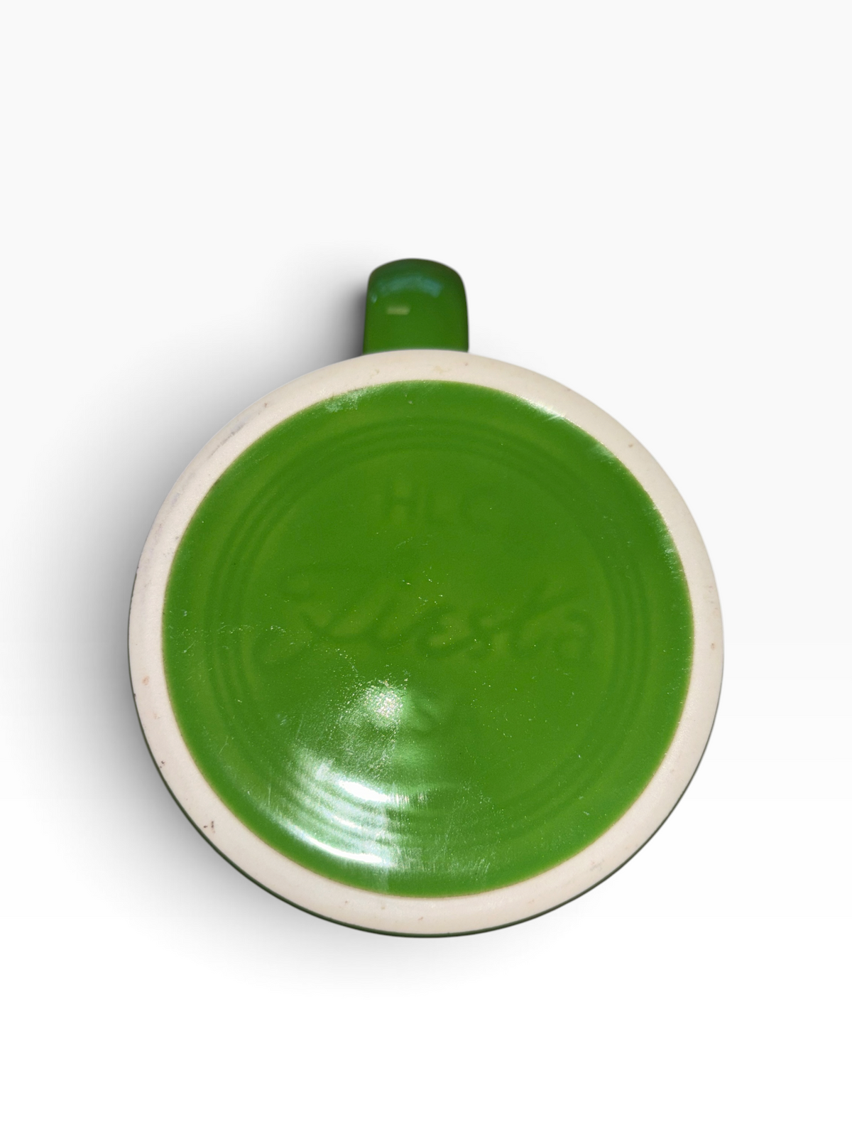 This is a Fiesta fiestware Java Mug featuring the Harvest Moon Witch decal on shamrock. Lead free Post 1986 Retired Color Retired Decal Halloween
