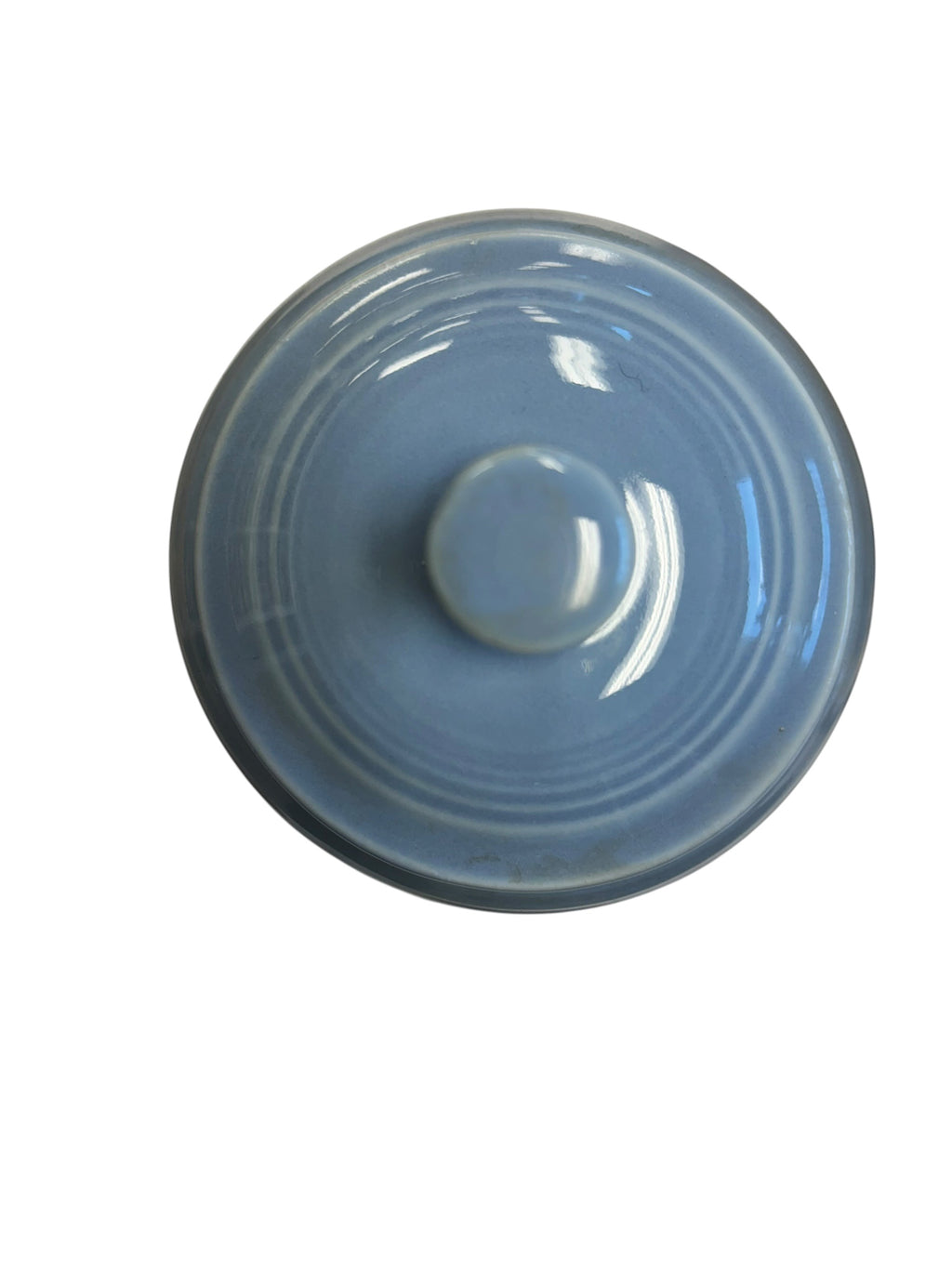 This is a Fiesta Fiestaware Individual Sugar Bowl With Lid in periwinkle. lead-free, Post 1986, Retired Color Retired Shape
