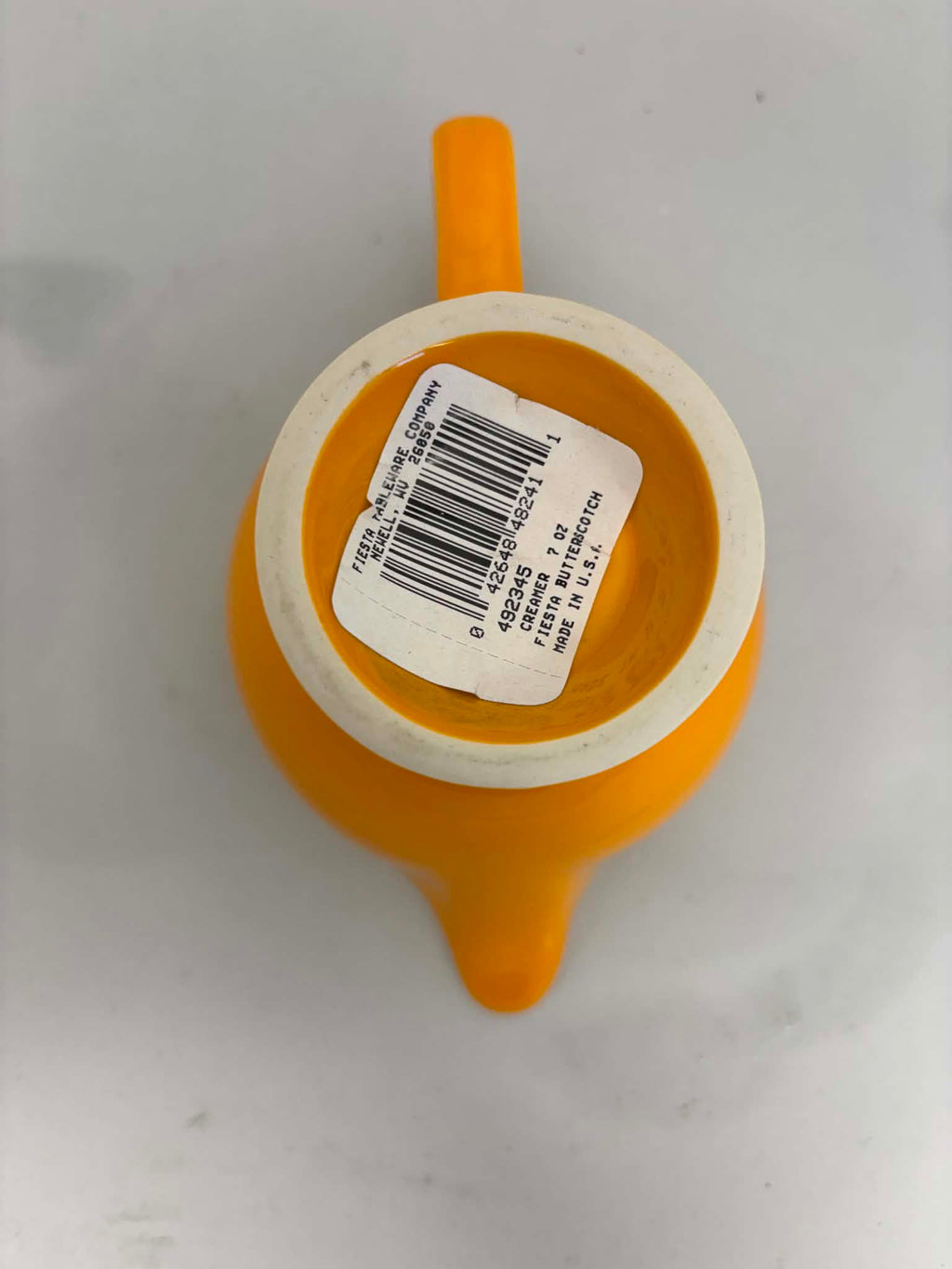 This is a Fiesta Fiestaware individual cream pitcher creamer in Butterscotch. lead-free, Post 1986, Retired Color Retired Shape New With Tags
