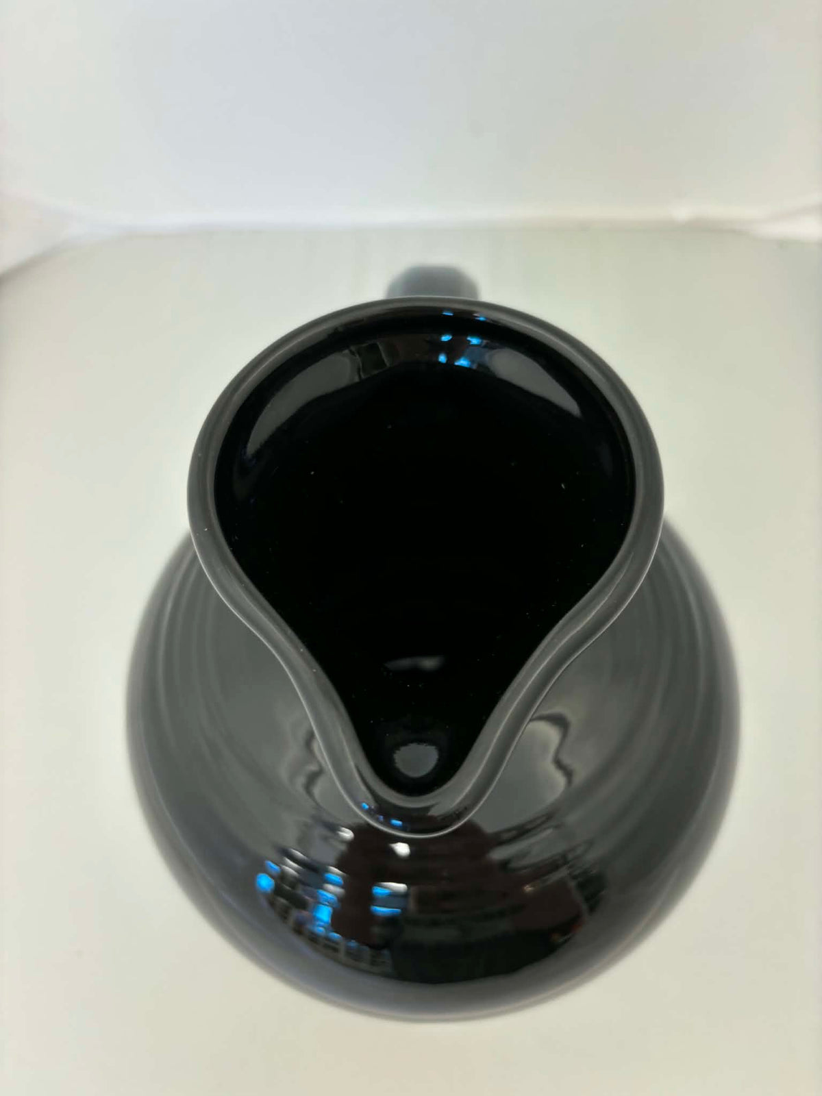 This is a Fiesta Fiestware small 60 Ounce Carafe in black. Lead-free Post 1986 Retired color retired shape
