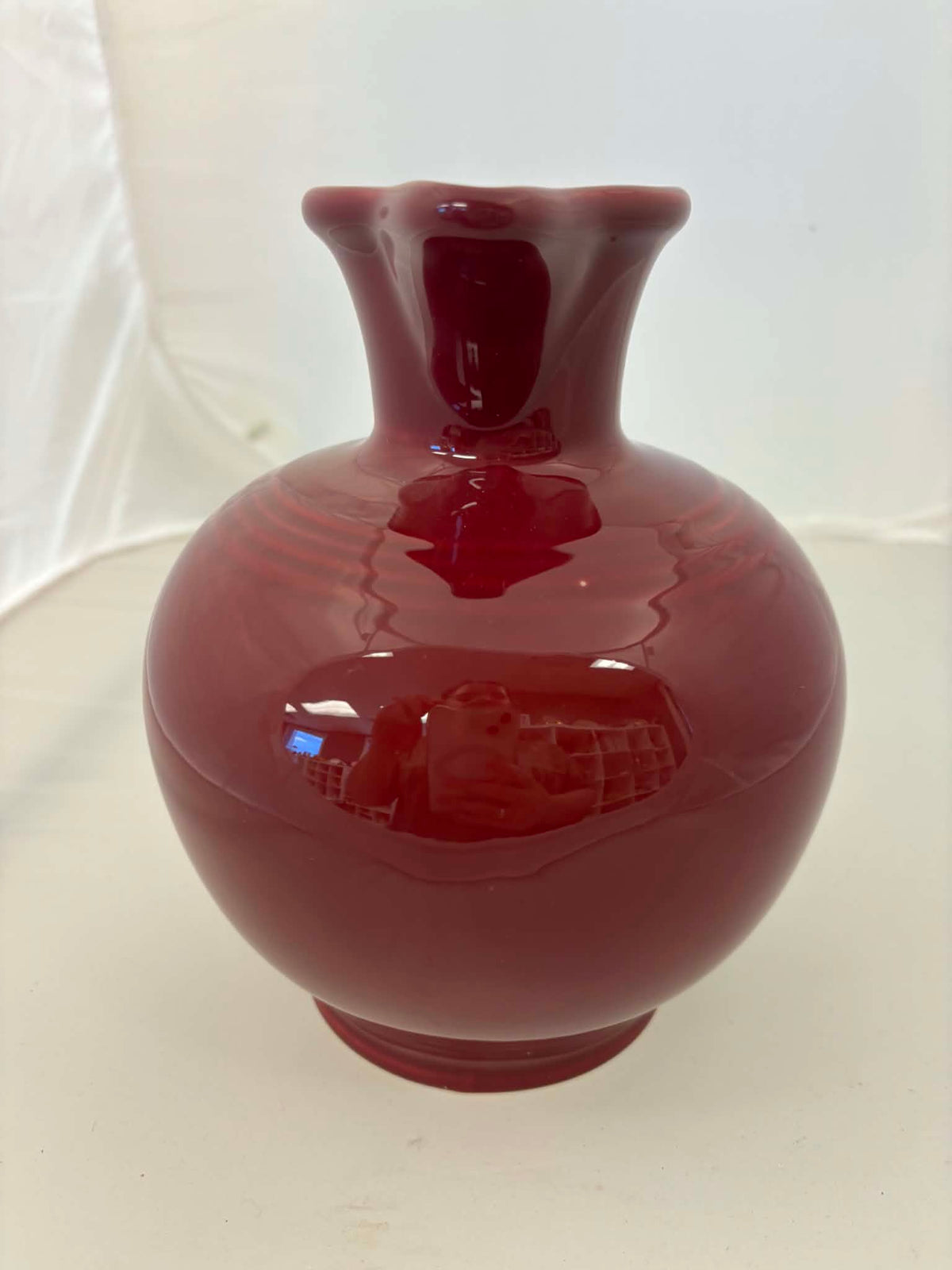 This is a Fiesta Fiestware small 60 Ounce Carafe in cinnabar. Lead-free Post 1986 Retired color retired shape
