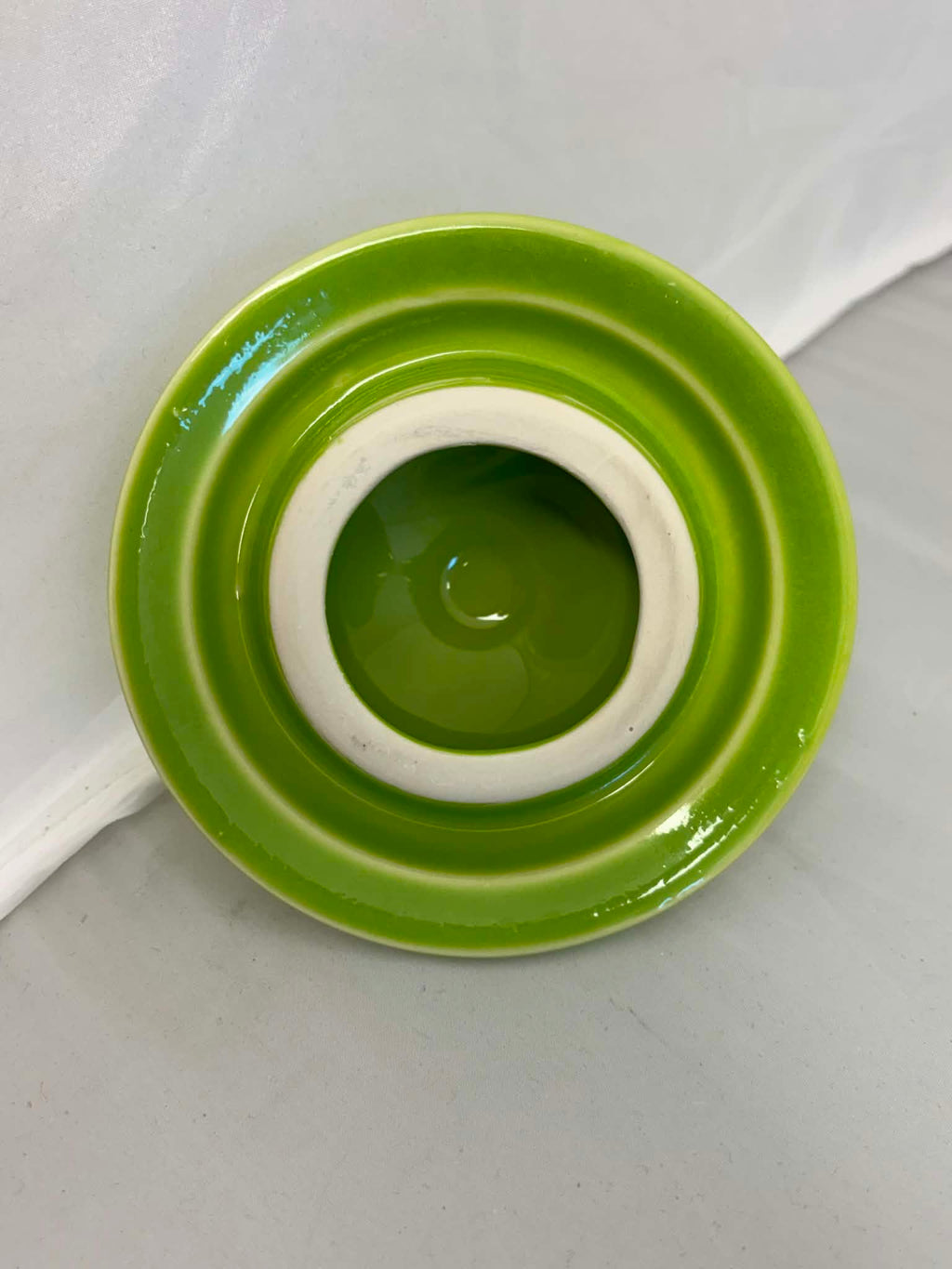This is a Fiesta Fiestaware Five-cup 5-cup Ring Handled Tea Pot with Lid in Chartreuse. lead-free, Post 1986, Retired Color Retired Shape
