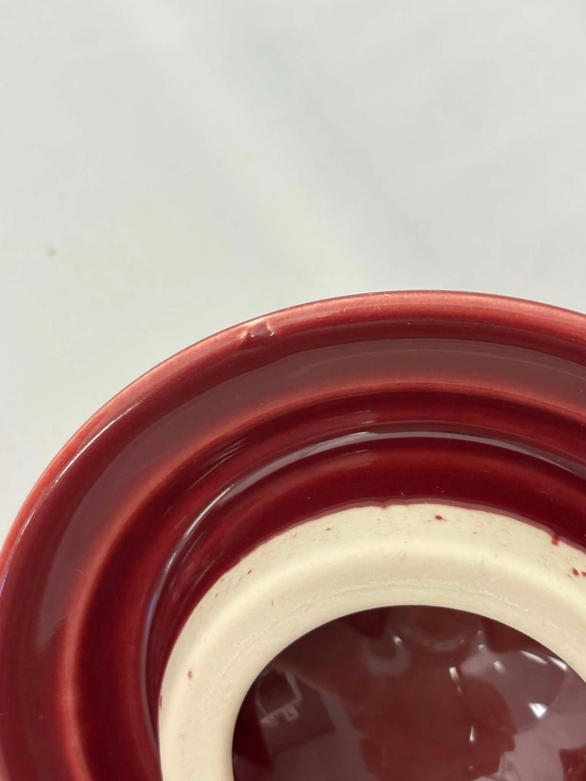 This is a Fiesta Fiestaware Five-cup 5-cup Ring Handled Tea Pot with Lid in Cinnabar. lead-free, Post 1986, Retired Color Retired Shape
