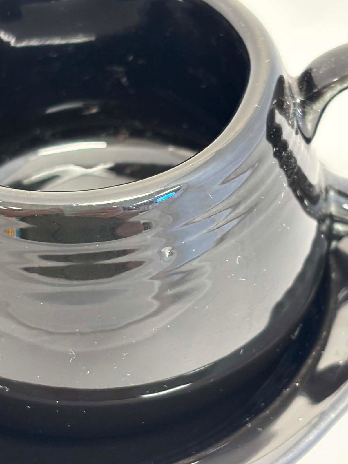 This is a Fiesta Fiestaware Creamer Pitcher Sugar Bowl with Lid on Figure Eight 8 Tray Set in black. lead-free, Post 1986, Retired Color Retired Shape
